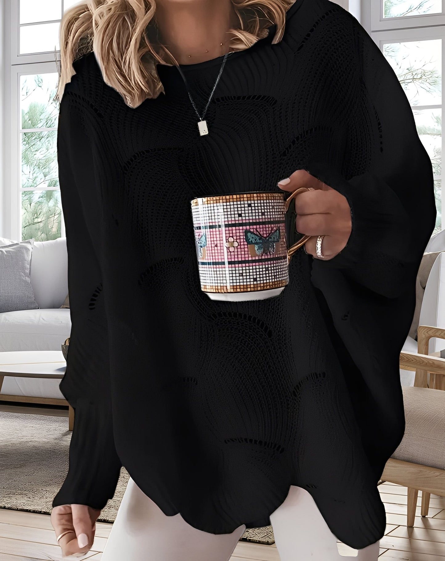 Kassandra - Modny, wycięty damski sweterek