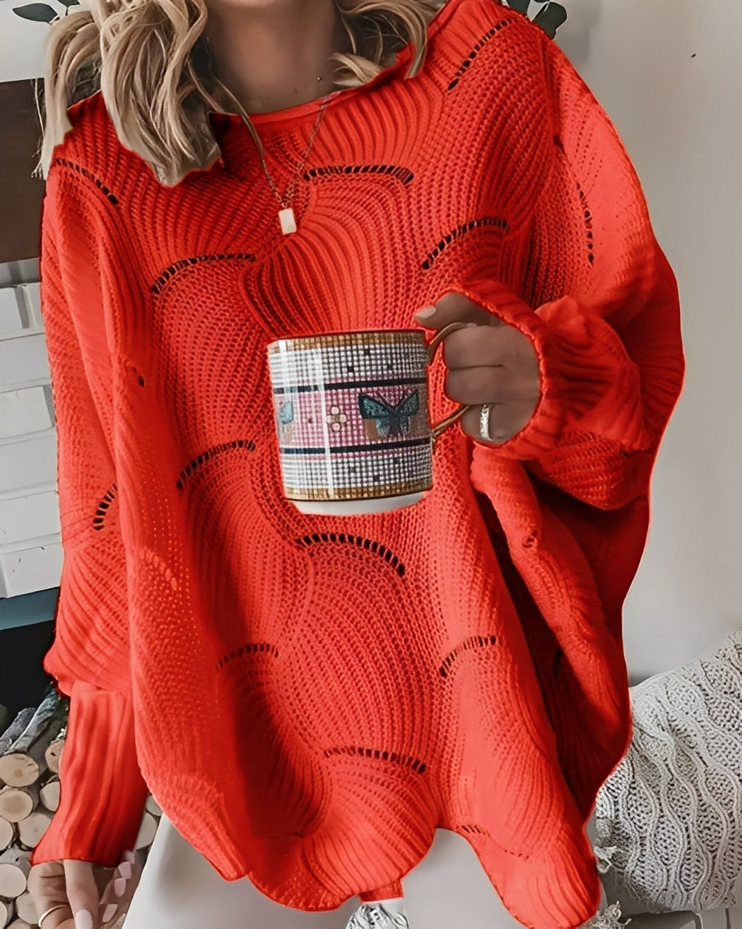 Kassandra - Modny, wycięty damski sweterek