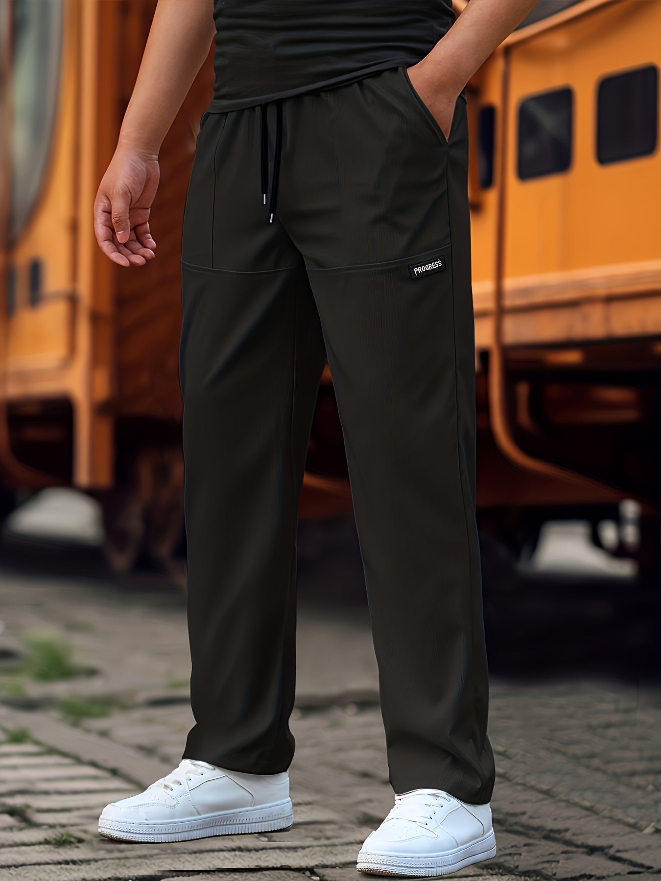 Esmund - Męskie luźne spodnie sportowe z trokami