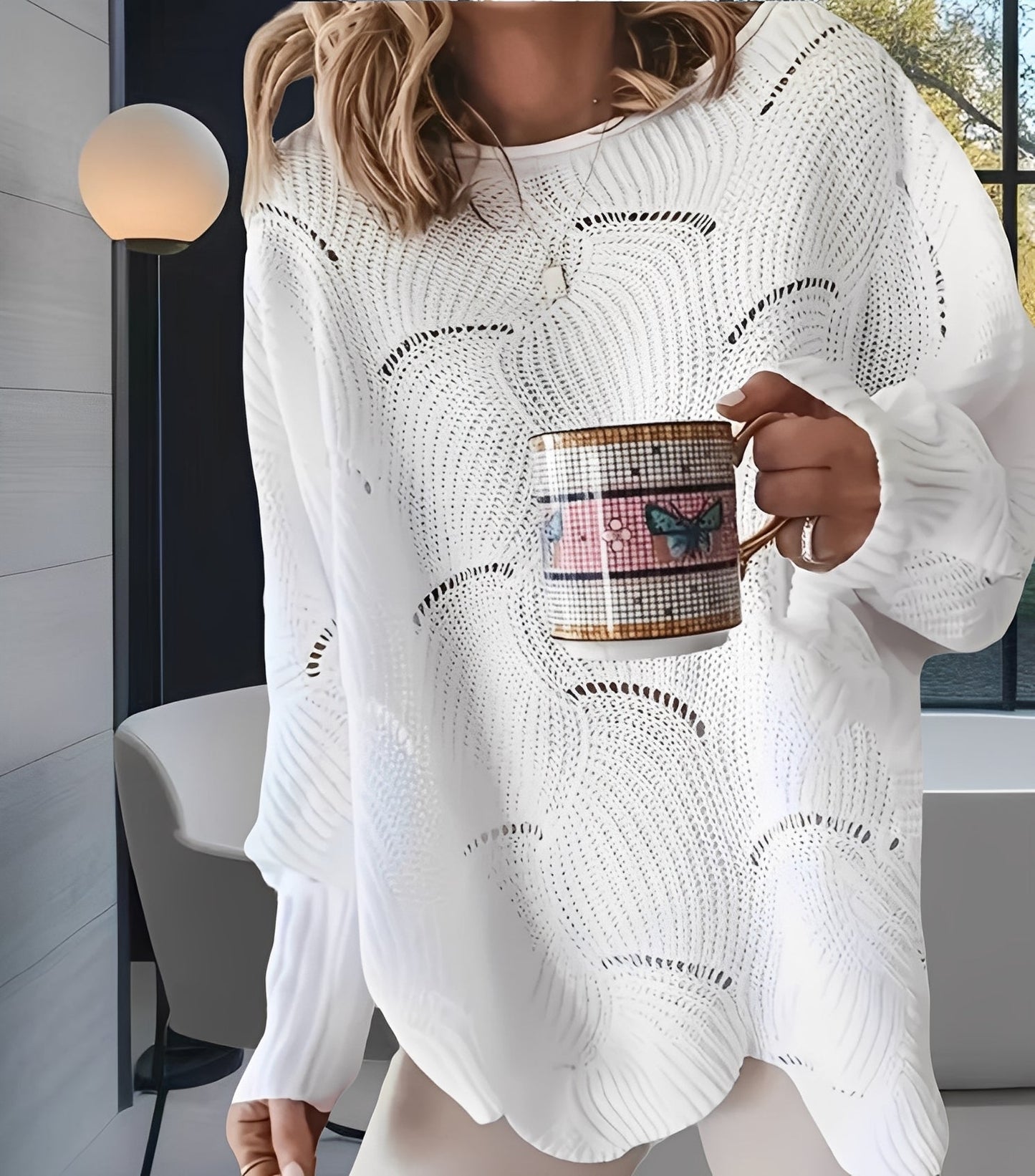 Kassandra - Modny, wycięty damski sweterek